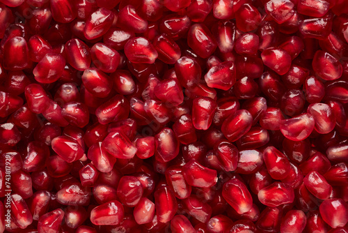 Pomegranate seeds background close up