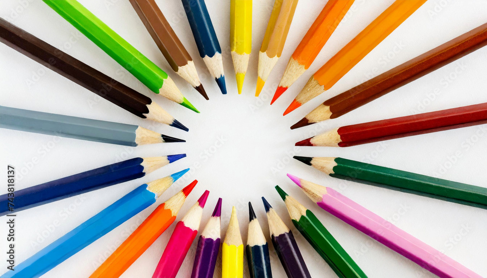 Colourful array of art pencils in creative rainbow spectrum, learning and education concept