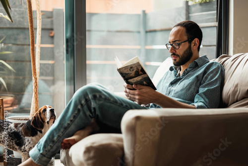 Man Reading with Dog