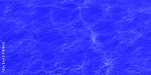 Modern Vivid deep blue water background. Transparent water in pool. Blue water with ripples on the surface. Defocus blurred blue water shining in the sea. rippled water detail background. 