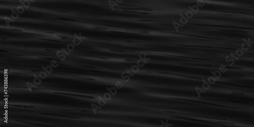 Luxury Black and white water surface of Oman's Sea under the rays of sun in twilight. Background and Texture. Water background. Abstract background of river water flow under the influence of light. 
