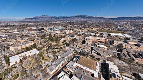 UNM Campus with Sandia mountains from a drone