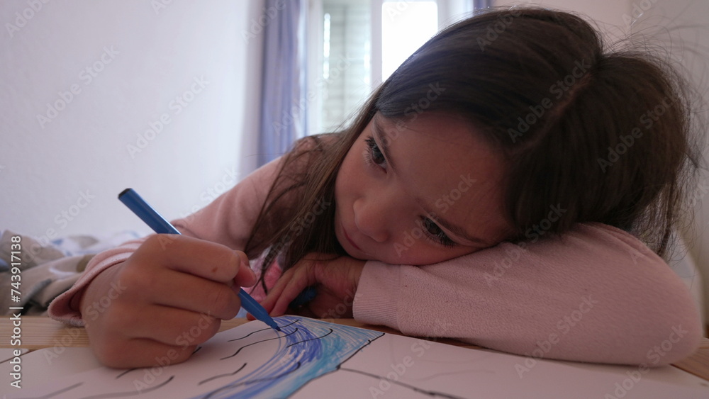 Artistic Childhood Development - Little Girl Concentrated on Drawing in Bedroom Artistic Childhood Development - Little Girl Concentrated on Drawing in Bedroom