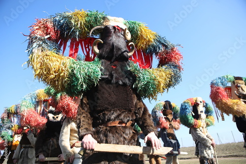 People called Kukeri parade in masks and ritual costumes, perform ritual dances to drive away evil spirits in the town of Elin Pelin, Bulgaria.