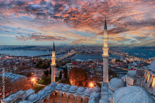 Suleymaniye Mosque dome and Istanbul at background night view in Istanbul photo