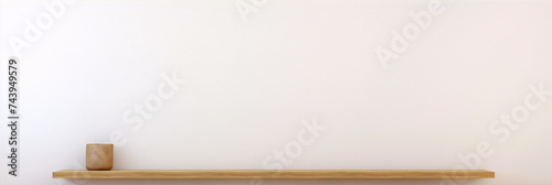 3D rendering of a minimal shelf with a wooden cup on it against a white wall.