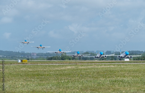 sequence of a passenger plane landing at Carrasco airport, Uruguay photo