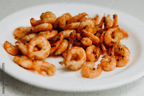 Delicious shrimp and mussels. Seafood on a white plate