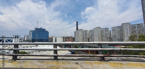 Buildings, sky, mexico city, clouds, trees, highway, second floor, road, car at cdmx, mexico photo