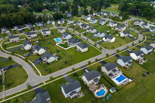 Aerial view of large private homes in Rochester, NY residential area. New family houses as example of real estate development in american suburbs