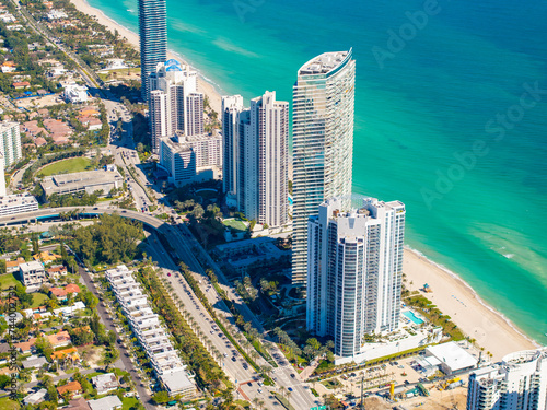 High aerial photo highrise condominiums on the beach Sunny Isles Miami 2024 © Felix Mizioznikov