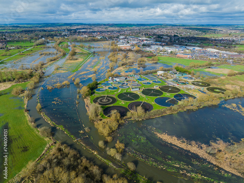 Aerial shot of sewerage farm on the River Avon when river is flooded and overflowing. photo