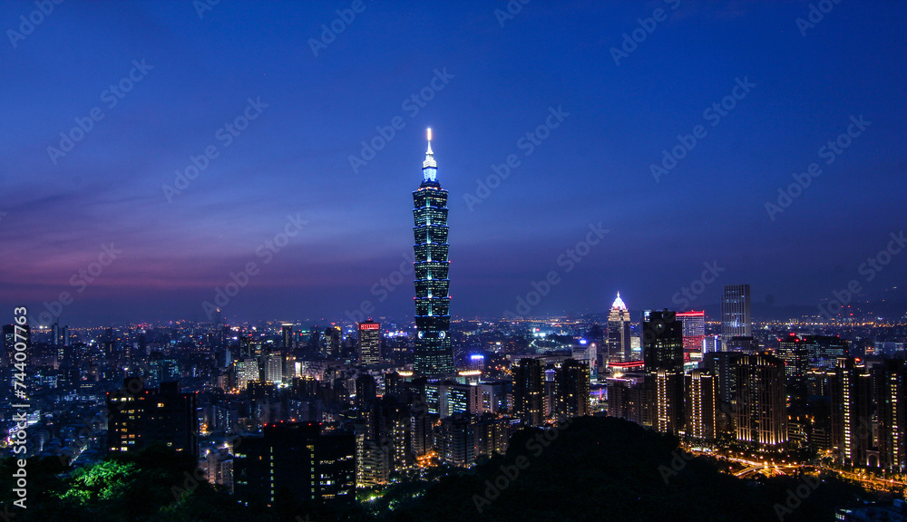 The scene of Taipei 101 building and Taipei city Taiwan. The photo has been taken from the top of Elephant Mountain, Taipei.