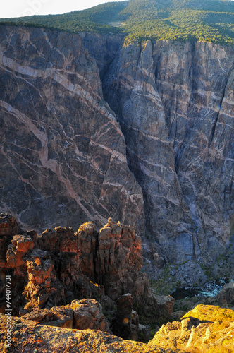 The sheer and streaked walls of the Black Canyon of the Gunnison National Park, Colorado, USA. photo