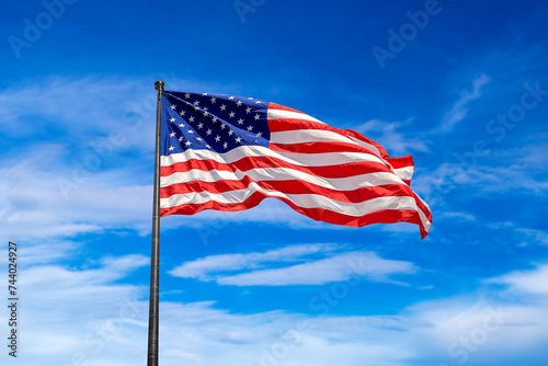USA flag waving against sky