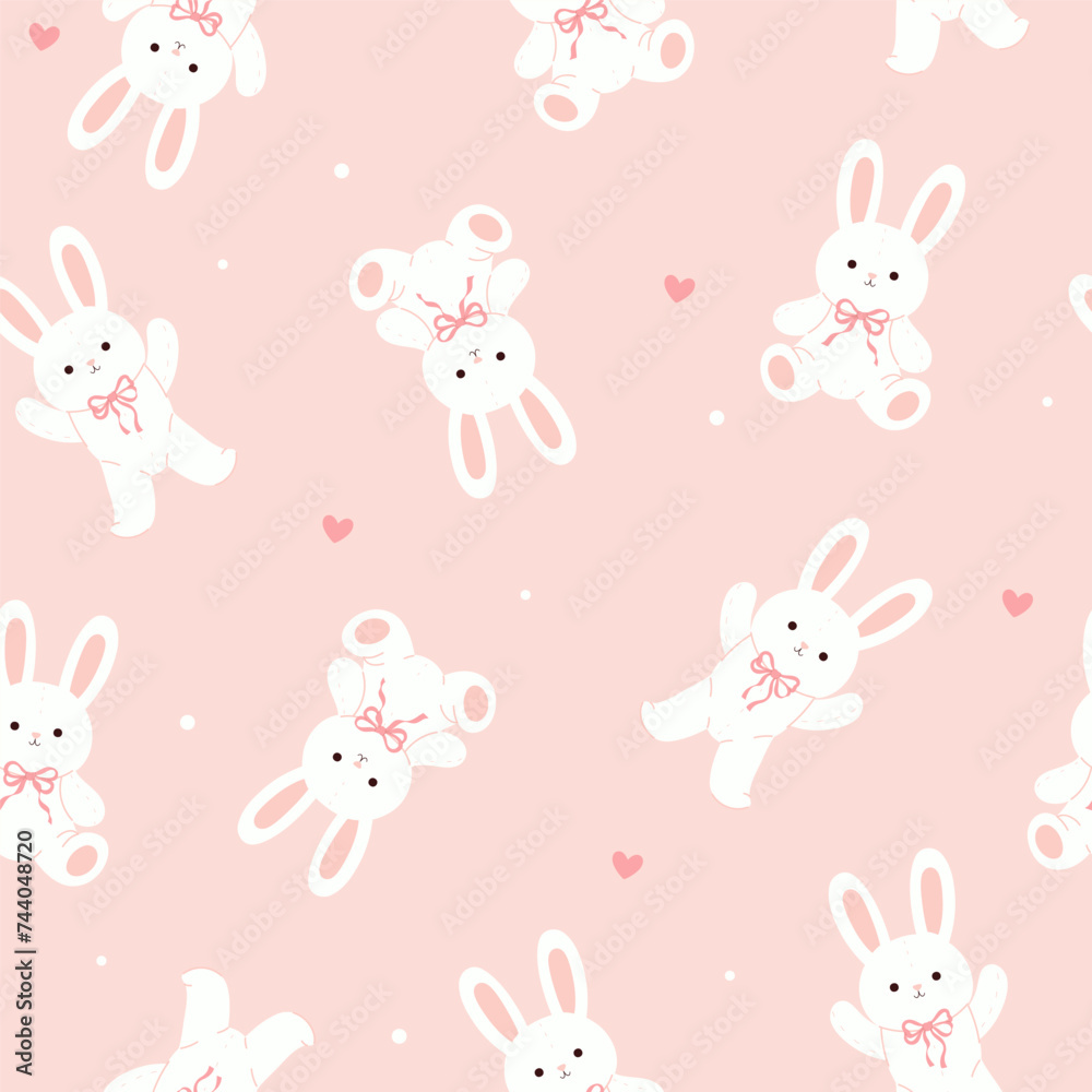 Seamless pattern with cute toy rabbits in soft pink colors. Vector graphics