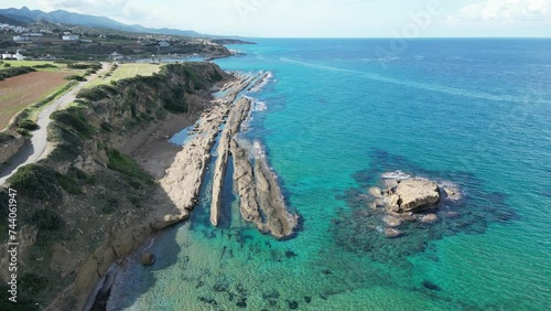 filming of the coast, sea, mountains and sky. smooth straight movement