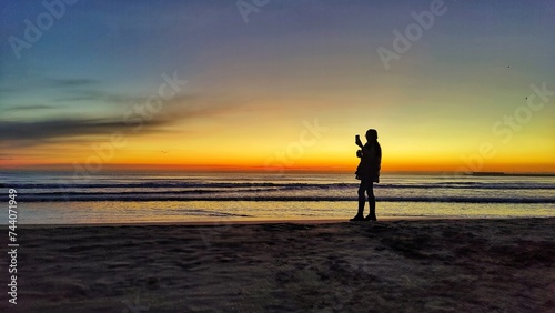 receiving the sunrise on Cabanyal beach