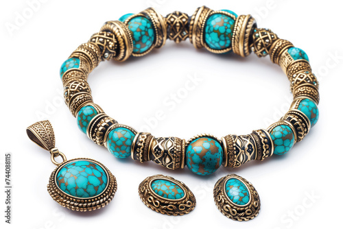 A stunning bracelet adorned with turquoise stones set in detailed gold beads, showcasing intricate designs, accompanied by a matching pendant. photo