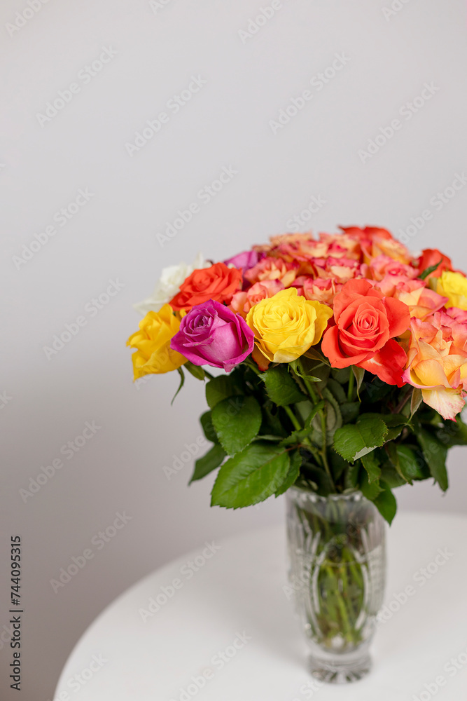 bouquet of roses on a table on a white background gift card