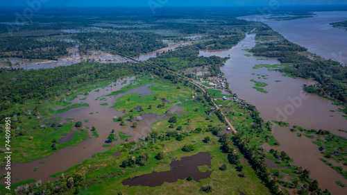 Aerial view of the BR 319 highway linking Manaus and Porto Velho in the Brazilian Amazon. The beginning of the route in Careiro da Várzea is surrounded by wetlands and rainforest. Amazonas, Brazil