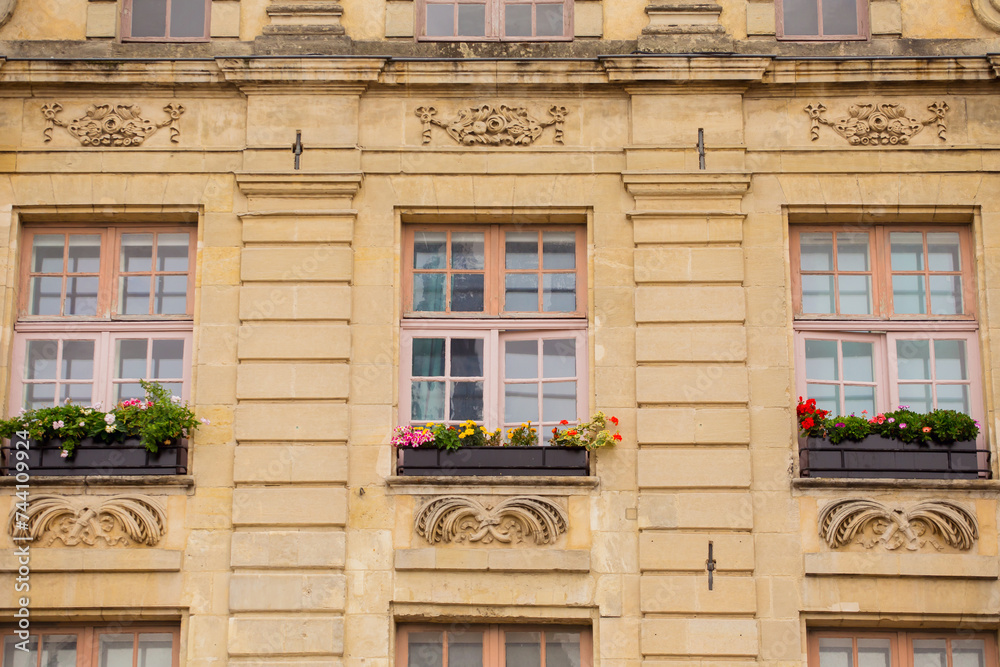 Obraz premium Closeup of a facade of an old building in Arras, France