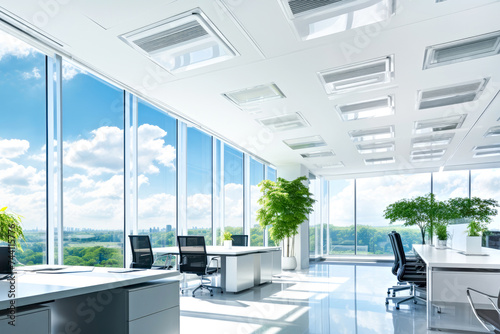 Ceiling-mounted air ventilation system in modern office. Concept corporate sustainability, eco-friendly, comfortable green workplace in socially responsible companies, SRI. Clean working environment photo