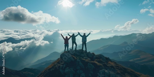 team-feeling concept, panorama view of group of people holding hands on hiking hill photo
