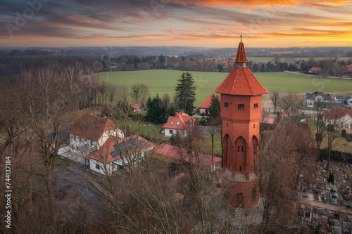 Fototapeta Naklejka Na Ścianę i Meble -  Teutonic castle in Paslek city at sunset, Poland.