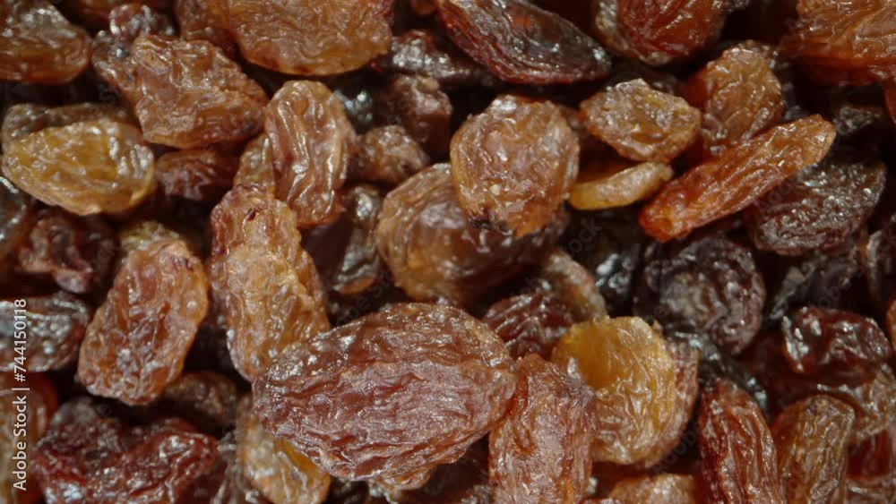 Raisins background, macro zoom. Dolly slider extreme close-up. Raisins background, macro zoom. Dolly slider extreme close-up.