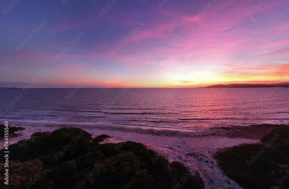 Pink sunset in Maria Pia beach