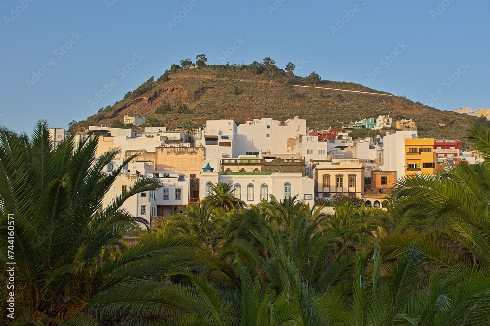 View of houses on the slope of the mountain in Arucas, Gran Canaria, Spain
