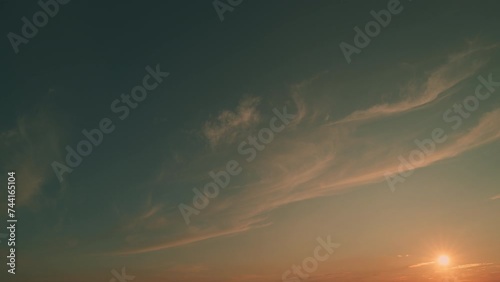 Cirrus or feather clouds against a blue sky. Natural beautiful scene. Purity and serenity concepts. photo