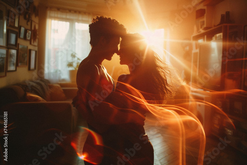 A couple dancing salsa in the privacy of their living room, the steps a shared language of love and connection. photo