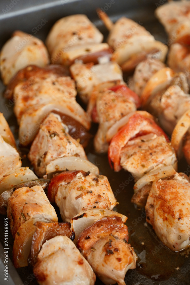 Chicken skewers with vegetables fresh from the oven.

