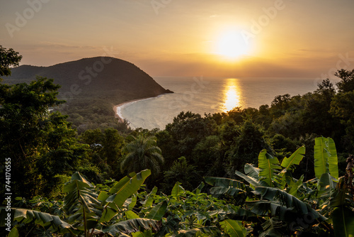 Guadeloupe, a Caribbean island in the French Antilles. View of Grande Anse beach. Beautiful view of the natural bay and sea at sunset. Landscape shot of a tropical dream © Jan