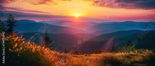 Vibrant sunset over mountainous landscape