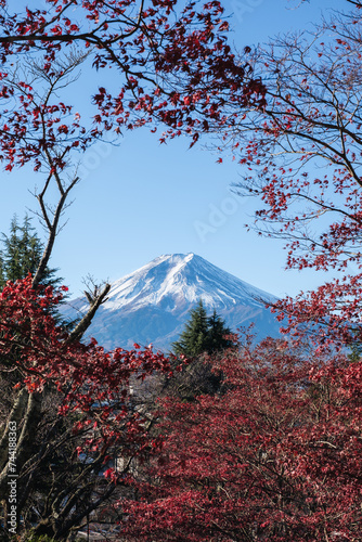 Mont Fuji beautiful view from Fujiyoshida in autumn with colorful maple leaves (momiji), Japan
