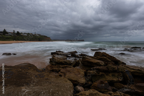 Stormy and cloudy morning at Warriewood Beach, Sydney, Australia. photo