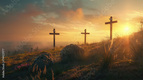 Image with three crosses on a hill at sunset for Easter feast Jesus Christ crucifixion concept. photo