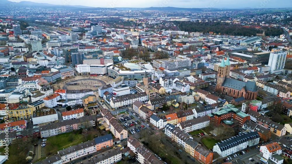 Aerial around the downtown of the city Kassel in Germany on a cloudy day in winter	
