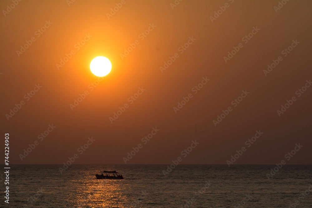 Golden Horizons: Gokarna's Sunset Seascapes