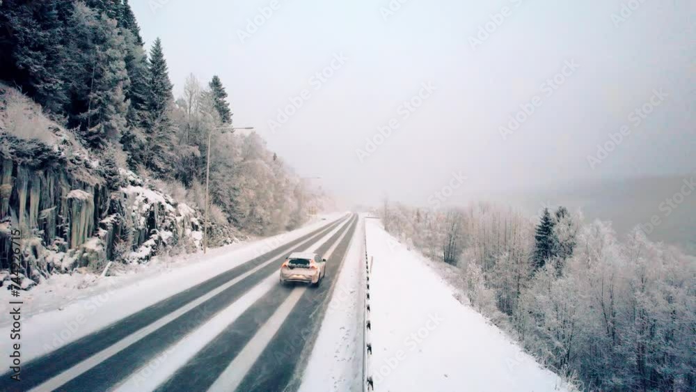 Volvo car driving in a cold landscape Volvo car driving in a cold landscape