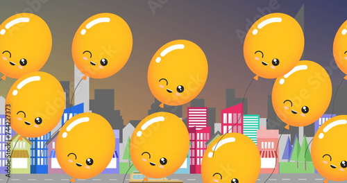 Image of yellow balloons with smile flying over cityscape