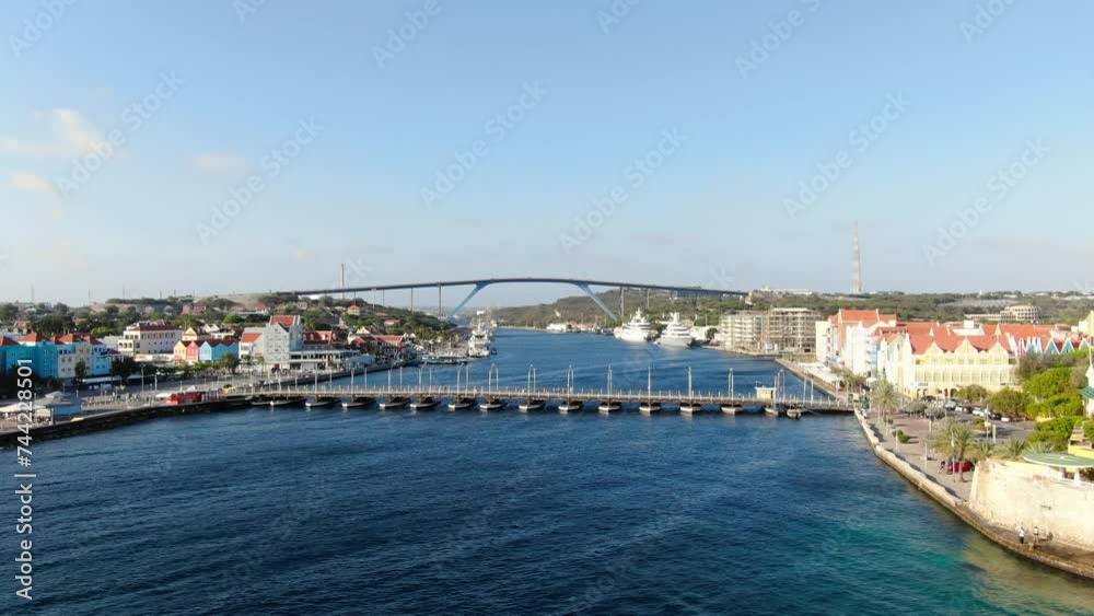 Aerial establish dolly of Queen Emma and Juliana bridges in Willemstad Curacao Aerial establish dolly of Queen Emma and Juliana bridges in Willemstad Curacao