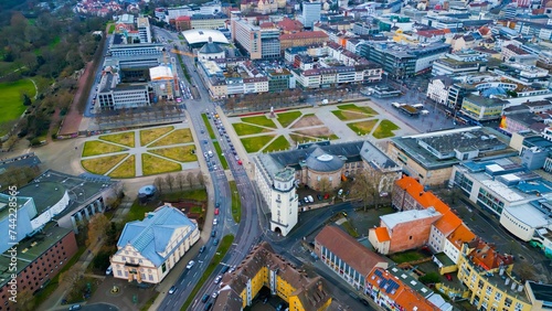 Aerial around the downtown of the city Kassel in Hessen  Germany on a cloudy day in early spring.  