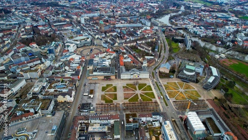 Aerial around the downtown of the city Kassel in Hessen, Germany on a cloudy day in early spring.   © Simona
