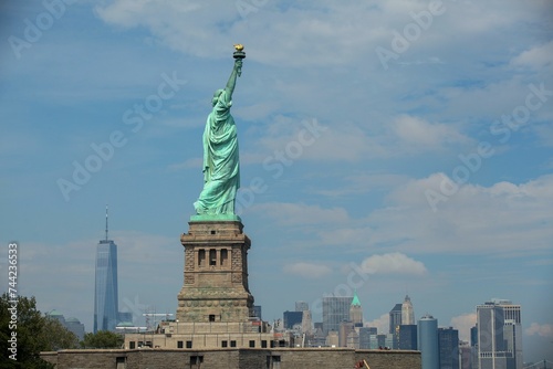 Statue of Liberty standing proudly against the skyline of New York