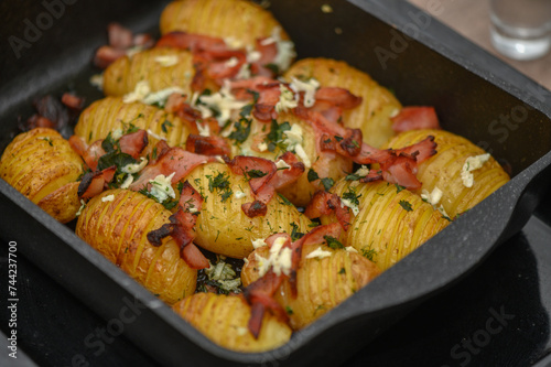 baked potatoes with bacon in the kitchen 1