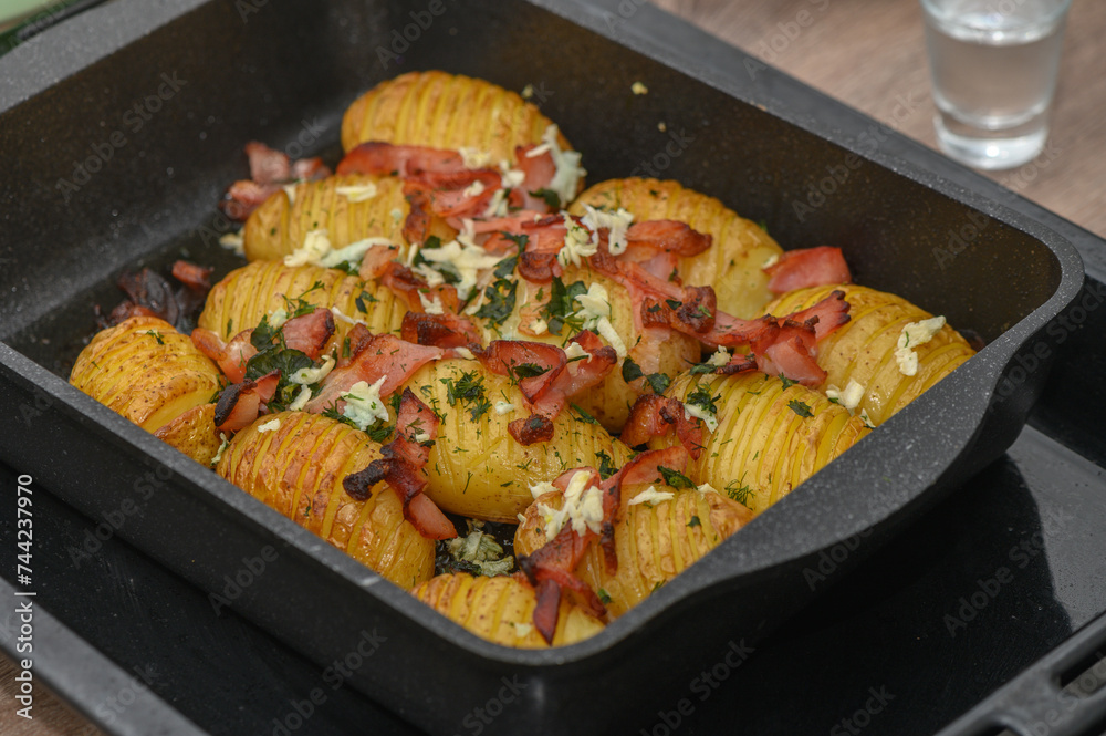 baked potatoes with bacon in the kitchen 2 baked potatoes with bacon in the kitchen 2